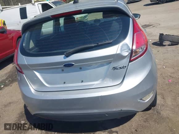 2014 Ford Fiesta S with VIN 3FADP4TJ5EM199405, listed as a IAAI auction lot 41915494 with 127,474 mi miles and . Bid and sale history available at DreamBid. Image 16.