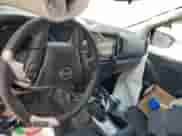 2024 Nissan Frontier S with VIN 1N6ED1CL7RN645229, listed as a Copart auction lot 60230155 with 51,679 mi miles and Salvage title. Bid and sale history available at DreamBid. Image 8.