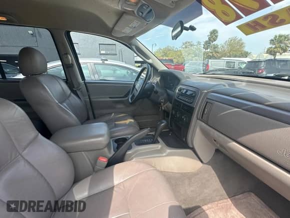 2004 Jeep Grand Cherokee Laredo z VIN 1J4GX48N24C436753, wystawiony jako Copart lot #48782585 z przebiegiem 114 035 mil mil oraz Czysty tytuł • Clean title. Historia ofert i sprzedaży dostępna na DreamBid. Obrazek 5.