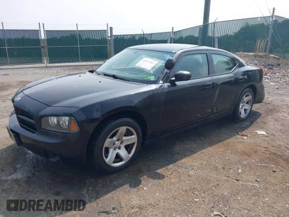 2009 Dodge Charger SE with VIN 2B3LA43V39H639833, listed as a IAAI auction lot 42423543 with 174,611 mi miles and . Bid and sale history available at DreamBid. Image 17.