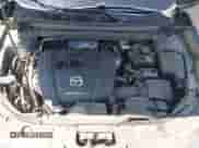 2022 Mazda CX-5 S Carbon Edition z VIN JM3KFBCM7N1601447, wystawiony jako IAAI lot #42463014 z przebiegiem 37 126 mil mil oraz . Historia ofert i sprzedaży dostępna na DreamBid. Obrazek 10.