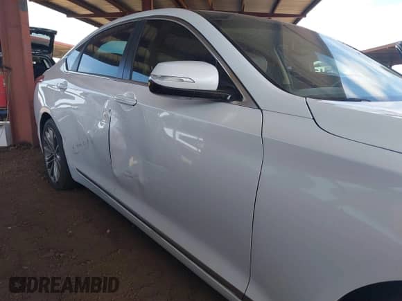 2015 Hyundai Genesis 3.8L with VIN KMHGN4JE3FU015302, listed as a IAAI auction lot 42923519 with 123,570 mi miles and . Bid and sale history available at DreamBid. Image 6.