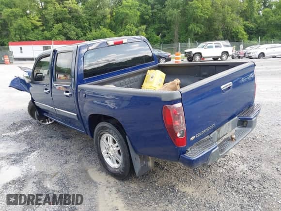 2011 Chevrolet Colorado 1LT z VIN 1GCHTCFE5B8124302, wystawiony jako IAAI lot #42494908 z przebiegiem 121 194 mil mil oraz . Historia ofert i sprzedaży dostępna na DreamBid. Obrazek 3.