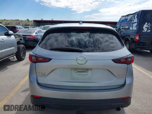 2022 Mazda CX-5 S Carbon Edition с VIN JM3KFBCMXN1557475, выставлен на аукционе IAAI как лот 42313581 с пробегом 81 276 миль миль и . История ставок и продаж доступна на DreamBid. Изображение 16.