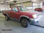 1998 Nissan Frontier z VIN 1N6DD21Y5WC321266, wystawiony jako Copart lot #54604825 z przebiegiem 225 689 mil mil oraz Czysty tytuł • Clean title. Historia ofert i sprzedaży dostępna na DreamBid. Obrazek 4.