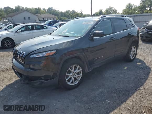 2014 Jeep Cherokee Latitude with VIN 1C4PJMCS2EW121407, listed as a Copart auction lot 68902205 with 206,550 mi miles and Salvage title. Bid and sale history available at DreamBid. Image 1.