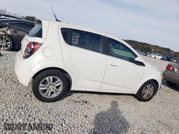 2012 Chevrolet Sonic LT с VIN 1G1JC6SH7C4143583, выставлен на аукционе Copart как лот 43457205 с пробегом 129 168 миль миль и Чистый • Clean title. История ставок и продаж доступна на DreamBid. Изображение 3.