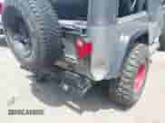 2001 Jeep Wrangler SE with VIN 1J4FA29P01P305939, listed as a IAAI auction lot 42624451 with 170,315 mi miles and . Bid and sale history available at DreamBid. Image 6.