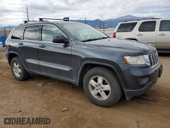 2012 Jeep Grand Cherokee Laredo z VIN 1C4RJFAG5CC202791, wystawiony jako Copart lot #86040175 z przebiegiem 206 265 mil mil oraz Szkoda całkowita • Salvage title. Historia ofert i sprzedaży dostępna na DreamBid. Obrazek 4.