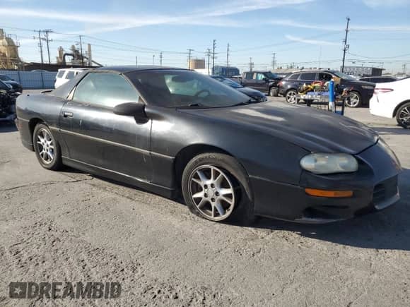 2001 Chevrolet Camaro с VIN 2G1FP22K212133755, выставлен на аукционе Copart как лот 50259825 с пробегом 78 287 миль миль и Чистый • Clean title. История ставок и продаж доступна на DreamBid. Изображение 4.