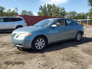 2009 Toyota Camry LE with VIN 4T1BK46K99U581860, listed as a Copart auction lot 81648085 with 142,794 mi miles and Salvage title. Bid and sale history available at DreamBid. Image 1.