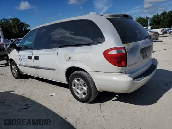 2003 Dodge Caravan SE with VIN 1D4GP24393B210280, listed as a Copart auction lot 70025055 with 148,586 mi miles and Salvage title. Bid and sale history available at DreamBid. Image 2.