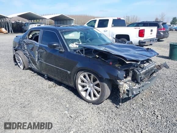 2006 Chrysler 300 C SRT-8 with VIN 2C3LA73W36H509656, listed as a IAAI auction lot 41852179 with 92,209 mi miles and . Bid and sale history available at DreamBid. Image 1.