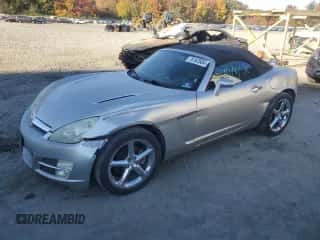 2007 Saturn Sky with VIN 1G8MB35B57Y124617, listed as a Copart auction lot 76162604 with 140,003 mi miles and Salvage title. Bid and sale history available at DreamBid. Image 1.