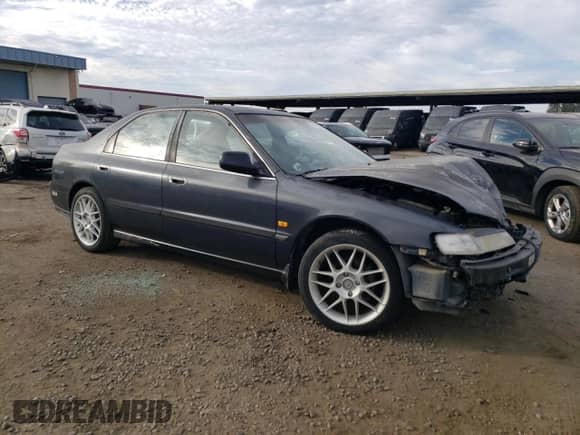 1994 Honda Accord LX z VIN 1HGCD5638RA190882, wystawiony jako Copart lot #78066224 z przebiegiem 211 919 mil mil oraz Szkoda całkowita • Salvage title. Historia ofert i sprzedaży dostępna na DreamBid. Obrazek 4.