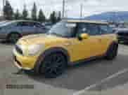 2009 MINI Hardtop S with VIN WMWMF73599TW87679, listed as a Copart auction lot 46863725 with 102,976 mi miles and Salvage title. Bid and sale history available at DreamBid. Image 1.