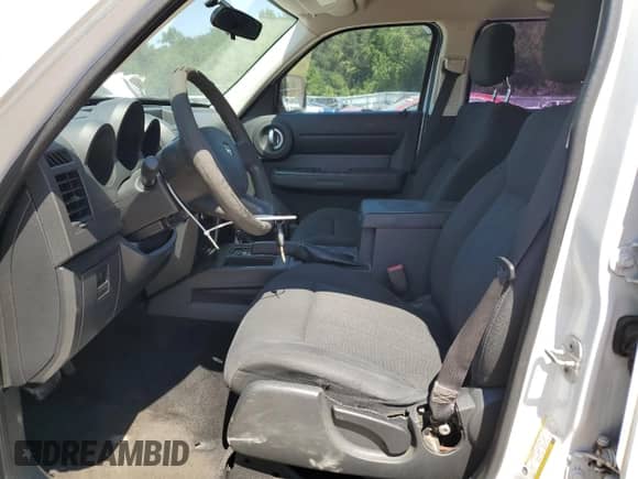 2011 Dodge Nitro SE z VIN 1D4PT2GK6BW595285, wystawiony jako Copart lot #80345735 z przebiegiem 168 147 mil mil oraz Szkoda całkowita • Salvage title. Historia ofert i sprzedaży dostępna na DreamBid. Obrazek 7.