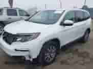 2020 Honda Pilot EX-L with VIN 5FNYF5H58LB023093, listed as a IAAI auction lot 42407550 with 34,378 mi miles and . Bid and sale history available at DreamBid. Image 18.