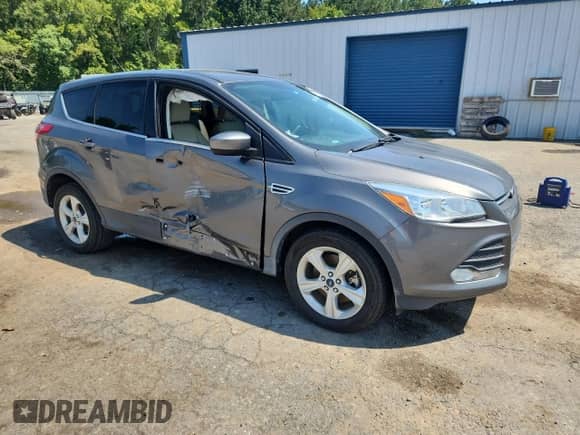 2014 Ford Escape SE with VIN 1FMCU0G98EUC75262, listed as a Copart auction lot 71550935 with 79,955 mi miles and Salvage title. Bid and sale history available at DreamBid. Image 4.