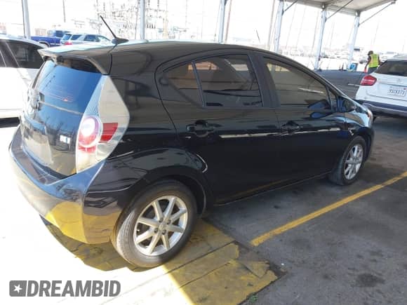 2014 Toyota Prius One z VIN JTDKDTB37E1069808, wystawiony jako IAAI lot #42867113 z przebiegiem 151 367 mil mil oraz . Historia ofert i sprzedaży dostępna na DreamBid. Obrazek 4.