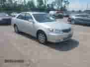 2002 Toyota Camry XLE with VIN JTDBF30K620081292, listed as a IAAI auction lot 42701432 with 146,950 mi miles and . Bid and sale history available at DreamBid. Image 1.