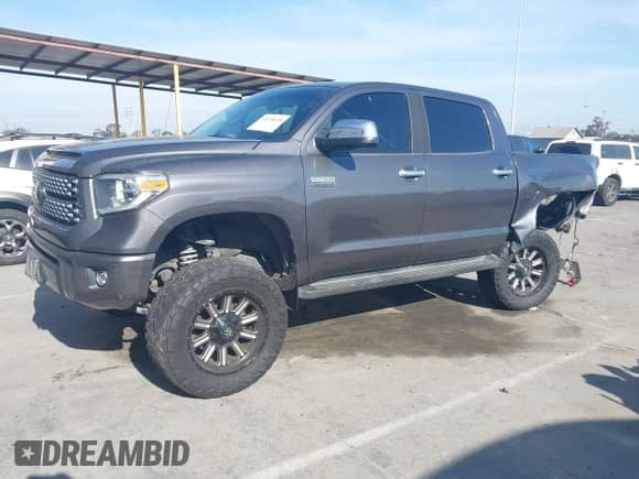 2019 Toyota Tundra SR5 with VIN 5TFAY5F18KX791740, listed as a IAAI auction lot 41198438 with 189,880 mi miles and . Bid and sale history available at DreamBid. Image 18.