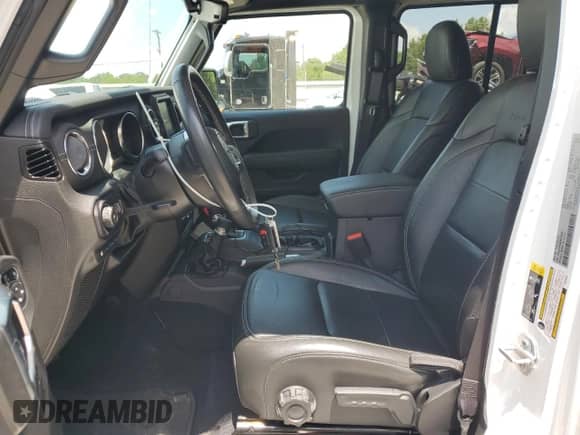 2022 Jeep Wrangler Unlimited Sahara with VIN 1C4JJXP69NW223291, listed as a Copart auction lot 64458055 with 24,574 mi miles and Salvage title. Bid and sale history available at DreamBid. Image 7.