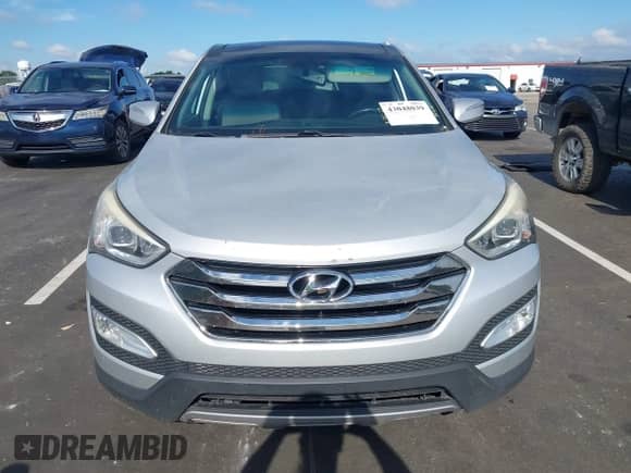 2013 Hyundai Santa Fe Sport with VIN 5XYZW3LA6DG001939, listed as a IAAI auction lot 43048039 with 180,925 mi miles and . Bid and sale history available at DreamBid. Image 12.