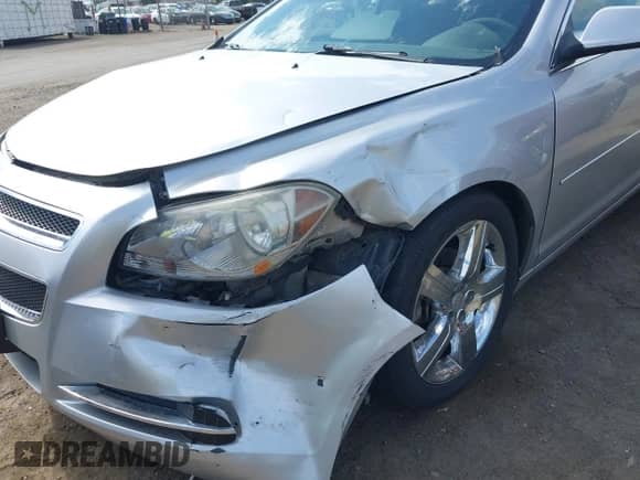 2012 Chevrolet Malibu 1LT z VIN 1G1ZC5E09CF301185, wystawiony jako IAAI lot #43294515 z przebiegiem 136 962 mil mil oraz . Historia ofert i sprzedaży dostępna na DreamBid. Obrazek 16.