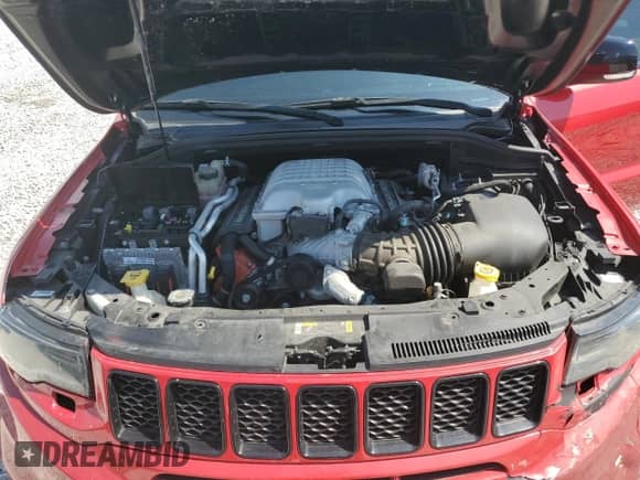 2021 Jeep Grand Cherokee Trackhawk z VIN 1C4RJFN90MC819951, wystawiony jako Copart lot #66509165 z przebiegiem 23 351 mil mil oraz Szkoda całkowita • Salvage title. Historia ofert i sprzedaży dostępna na DreamBid. Obrazek 12.