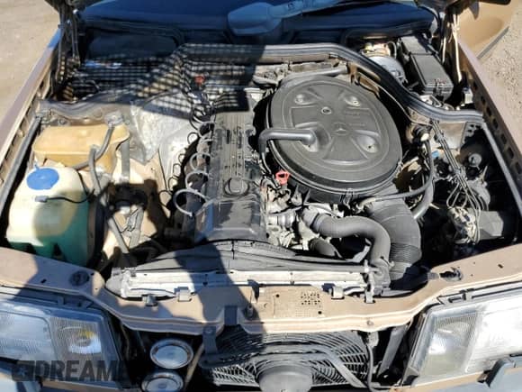 1986 Mercedes-Benz 300 E z VIN WDBEA30D5GA179467, wystawiony jako Copart lot #77548064 z przebiegiem 149 840 mil mil oraz Szkoda całkowita • Salvage title. Historia ofert i sprzedaży dostępna na DreamBid. Obrazek 11.