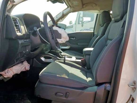 2024 Nissan Frontier SV with VIN 1N6ED1EJ3RN634398, listed as a Copart auction lot 67747525 with 8,906 mi miles and Salvage title. Bid and sale history available at DreamBid. Image 7.