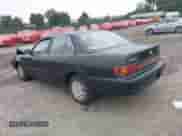 1993 Toyota Camry LE z VIN 4T1SK12E2PU176189, wystawiony jako IAAI lot #42711266 z przebiegiem 141 263 mil mil oraz . Historia ofert i sprzedaży dostępna na DreamBid. Obrazek 3.