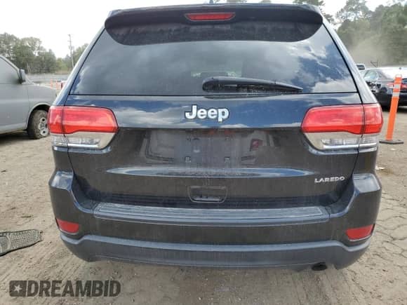 2014 Jeep Grand Cherokee Laredo with VIN 1C4RJEAG4EC207784, listed as a Copart auction lot 81490235 with 165,048 mi miles and Salvage title. Bid and sale history available at DreamBid. Image 6.