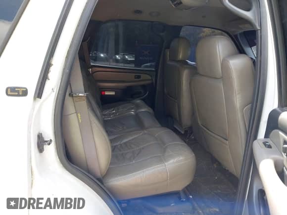 2002 Chevrolet Tahoe LT z VIN 1GNEK13Z42J197579, wystawiony jako IAAI lot #43212866 z przebiegiem 313 693 mil mil oraz . Historia ofert i sprzedaży dostępna na DreamBid. Obrazek 8.