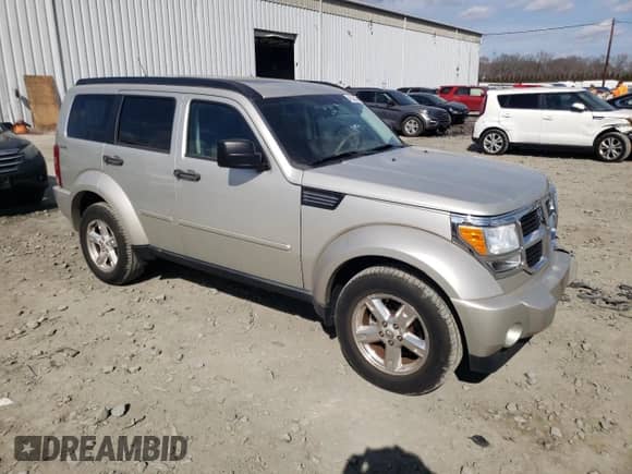 2009 Dodge Nitro SXT with VIN 1D8GU28K69W554000, listed as a Copart auction lot 46223965 with 90,148 mi miles and Salvage title. Bid and sale history available at DreamBid. Image 4.