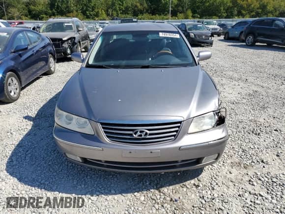 2007 Hyundai Azera SE с VIN KMHFC46F37A233990, выставлен на аукционе Copart как лот 74978354 с пробегом 158 902 миль миль и Списание • Salvage title. История ставок и продаж доступна на DreamBid. Изображение 5.
