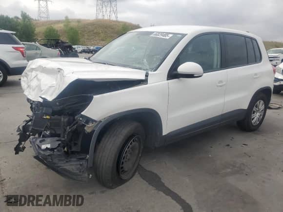 2013 Volkswagen Tiguan S с VIN WVGCV7AX0DW513556, выставлен на аукционе Copart как лот 66829465 с пробегом 164 597 миль миль и Списание • Salvage title. История ставок и продаж доступна на DreamBid. Изображение 1.