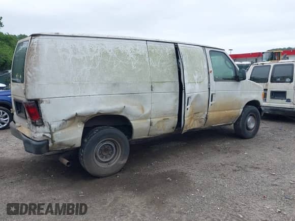 2006 Ford Econoline Cargo with VIN 1FTNE24W26HA14641, listed as a IAAI auction lot 42511489 with 341,226 mi miles and . Bid and sale history available at DreamBid. Image 4.