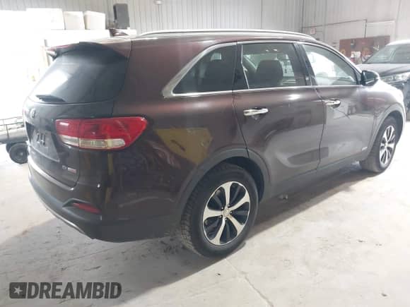 2016 Kia Sorento EX z VIN 5XYPHDA10GG019769, wystawiony jako IAAI lot #42567062 z przebiegiem 92 448 mil mil oraz . Historia ofert i sprzedaży dostępna na DreamBid. Obrazek 4.