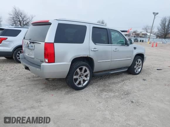 2011 Cadillac Escalade with VIN 1GYS4AEF5BR140506, listed as a IAAI auction lot 41504768 with 150,591 mi miles and . Bid and sale history available at DreamBid. Image 4.
