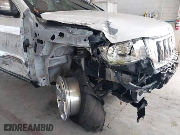 2013 Jeep Grand Cherokee Limited z VIN 1C4RJEBG6DC595730, wystawiony jako IAAI lot #43418036 z przebiegiem 163 431 mil mil oraz . Historia ofert i sprzedaży dostępna na DreamBid. Obrazek 17.