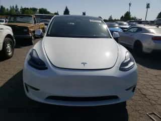 2023 Tesla Model Y Long Range with VIN 7SAYGDEE4PF835303, listed as a Copart auction lot 65903654 with 15,872 mi miles and Salvage title. Bid and sale history available at DreamBid. Image 5.