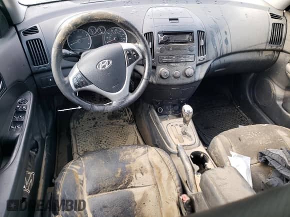 2012 Hyundai Elantra GLS z VIN KMHDC8AE8CU138170, wystawiony jako Copart lot #67416755 z przebiegiem 155 676 mil mil oraz Szkoda całkowita • Salvage title. Historia ofert i sprzedaży dostępna na DreamBid. Obrazek 8.