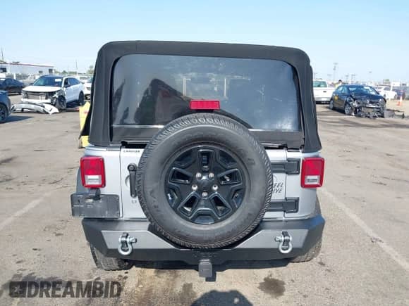 2015 Jeep Wrangler Sport with VIN 1C4AJWAG0FL773008, listed as a IAAI auction lot 42422112 with 88,370 mi miles and . Bid and sale history available at DreamBid. Image 16.