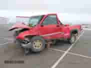 2002 GMC Sierra 1500 SLE z VIN 1GTEK19T72E179324, wystawiony jako IAAI lot #41453383 z przebiegiem Nie podano mil oraz . Historia ofert i sprzedaży dostępna na DreamBid. Obrazek 17.