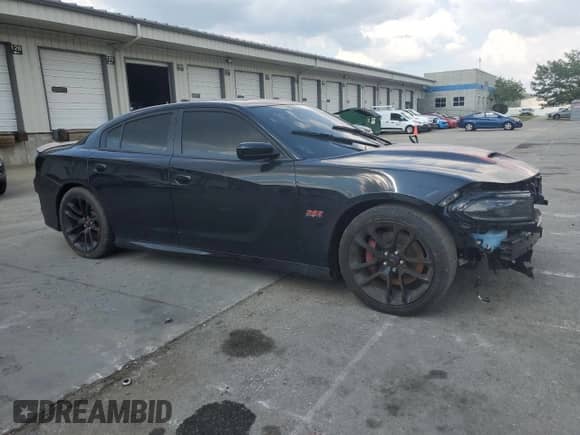 2023 Dodge Charger Scat Pack with VIN 2C3CDXGJXPH506728, listed as a Copart auction lot 67842285 with 16,932 mi miles and Salvage title. Bid and sale history available at DreamBid. Image 4.