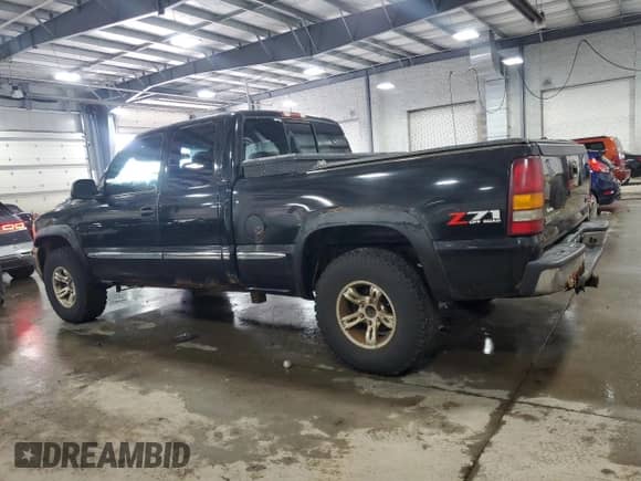 2002 GMC Sierra 1500 SLE with VIN 2GTEK19TX21220451, listed as a Copart auction lot 68935095 with 225,478 mi miles and Clean title. Bid and sale history available at DreamBid. Image 2.