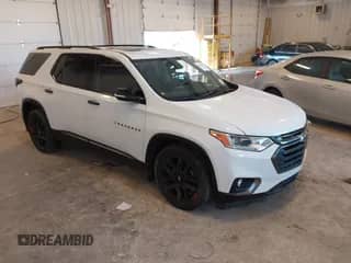 2020 Chevrolet Traverse Premier z VIN 1GNEVKKWXLJ100312, wystawiony jako IAAI lot #43123685 z przebiegiem 113 447 mil mil oraz . Historia ofert i sprzedaży dostępna na DreamBid. Obrazek 1.