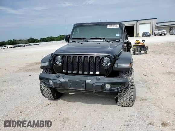 2023 Jeep Wrangler Willys with VIN 1C4HJXDGXPW526093, listed as a Copart auction lot 56818935 with 24,021 mi miles and Salvage title. Bid and sale history available at DreamBid. Image 13.